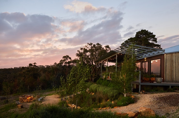 The Machinery Shed cabin Airbnb at dusk