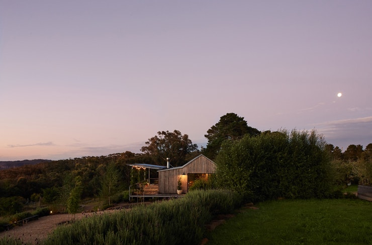 The Machinery Shed cabin Airbnb at dusk