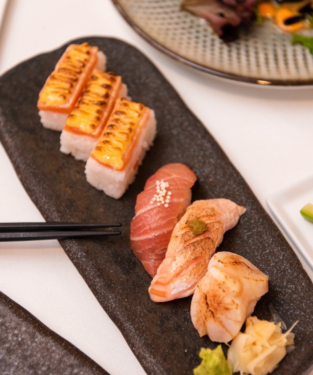 A plate of aburi sushi