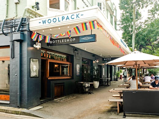 The front of The Woolpack hotel in Redfern, which features outdoor seating. 
