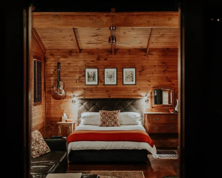 A view of the bedroom at The Bower one of the best romantic getaways Queensland