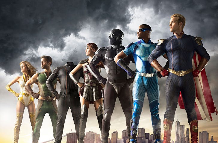 The alleged superheroes stand in a line.