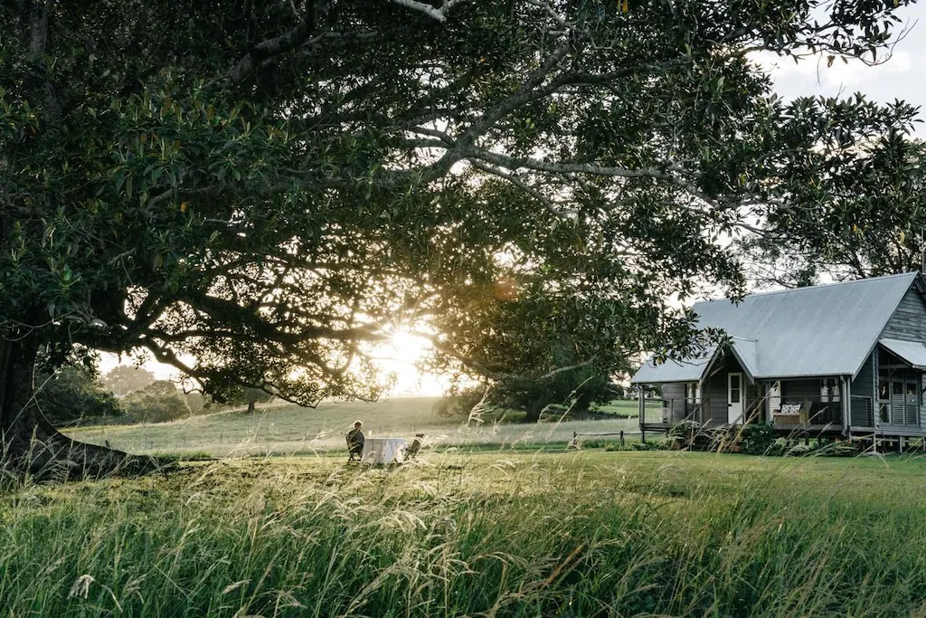 a beautiful cottage in a field