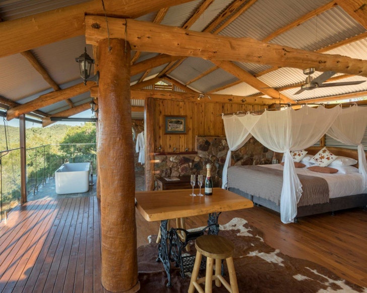 The bedroom and living space at Gilberton Outback Retreat one of the best romantic getaways Queensland