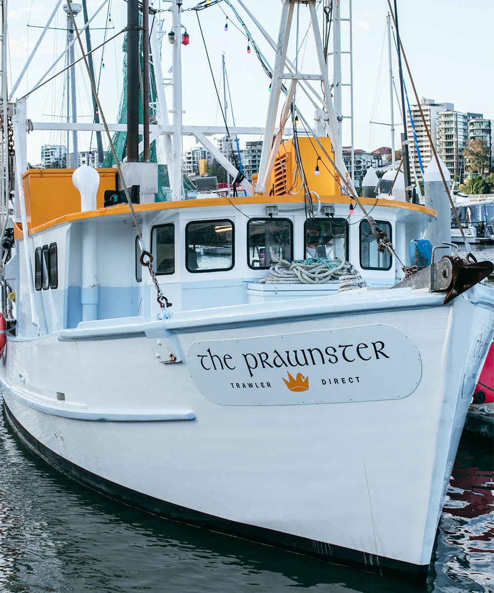 A prawn trawler in a marina