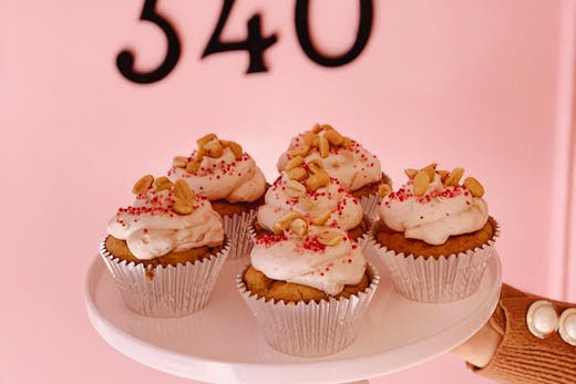 A cake stand topped with Peanut butter jelly cupcakes from The Sunday Baker in Sydney.