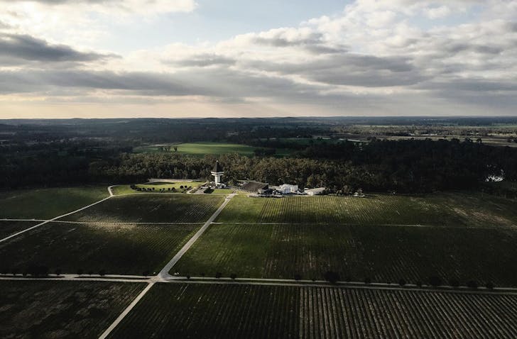 An aerial shot of Mitchelton Hotel and the surrounding estate including it's many vines.