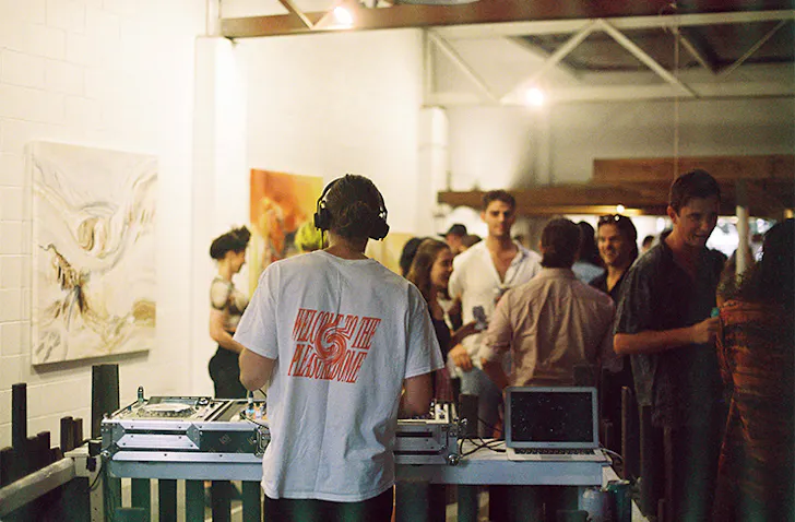 a DJ at an art gallery