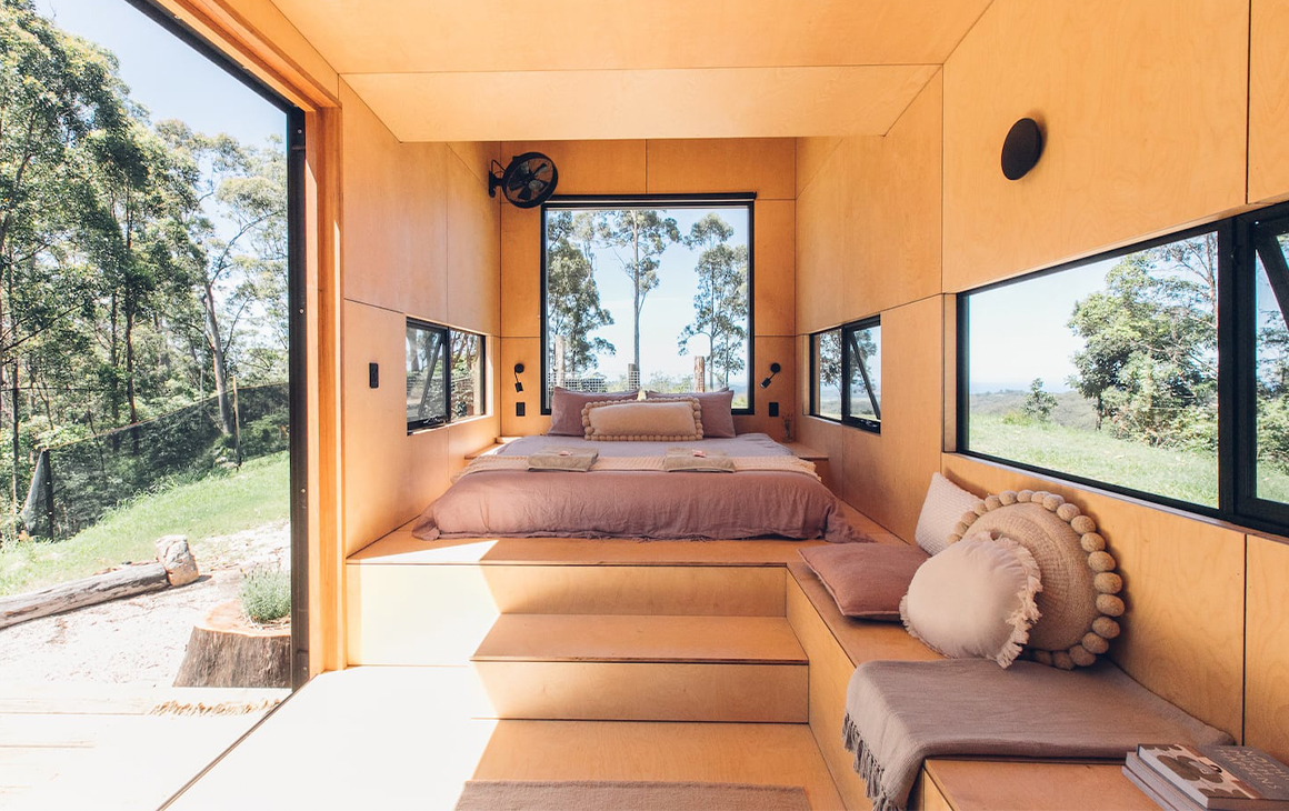 a terracotta coloured tiny house