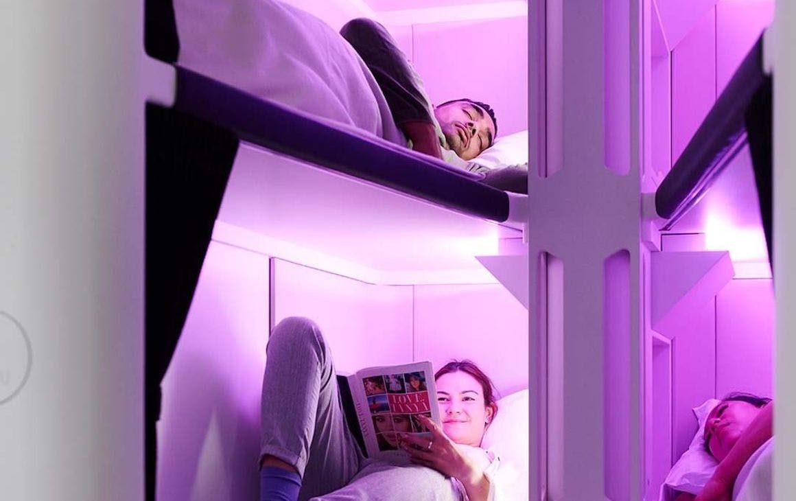 four bunkbeds on an airplane