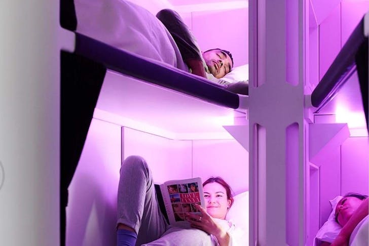 four bunkbeds on an airplane