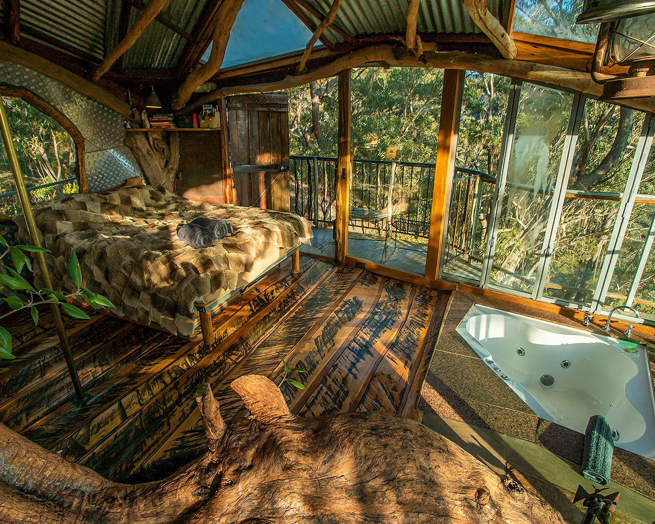 An absolutely amazing looking treehouse right up in the tree tops.