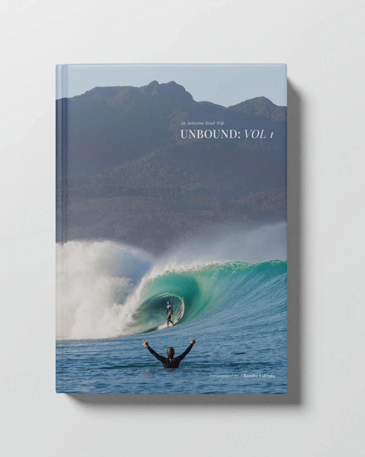 Rambo Estrada's 'Unbound: Vol 1' with a surfing inside a curling blue wave on the cover.