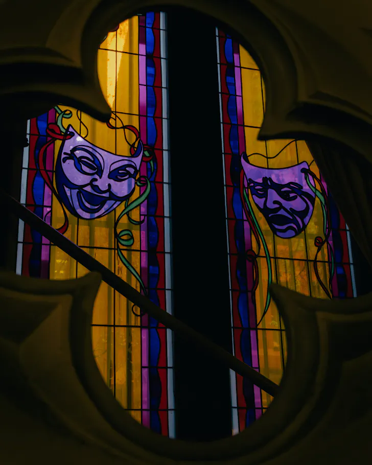 Stained glass windows at Unholy Playhouse's new location.