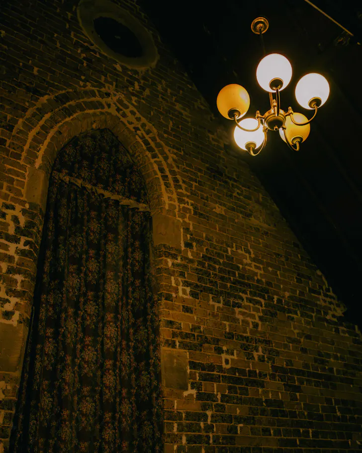 The brick interior of a heritage listed church in Sydney's CBD.