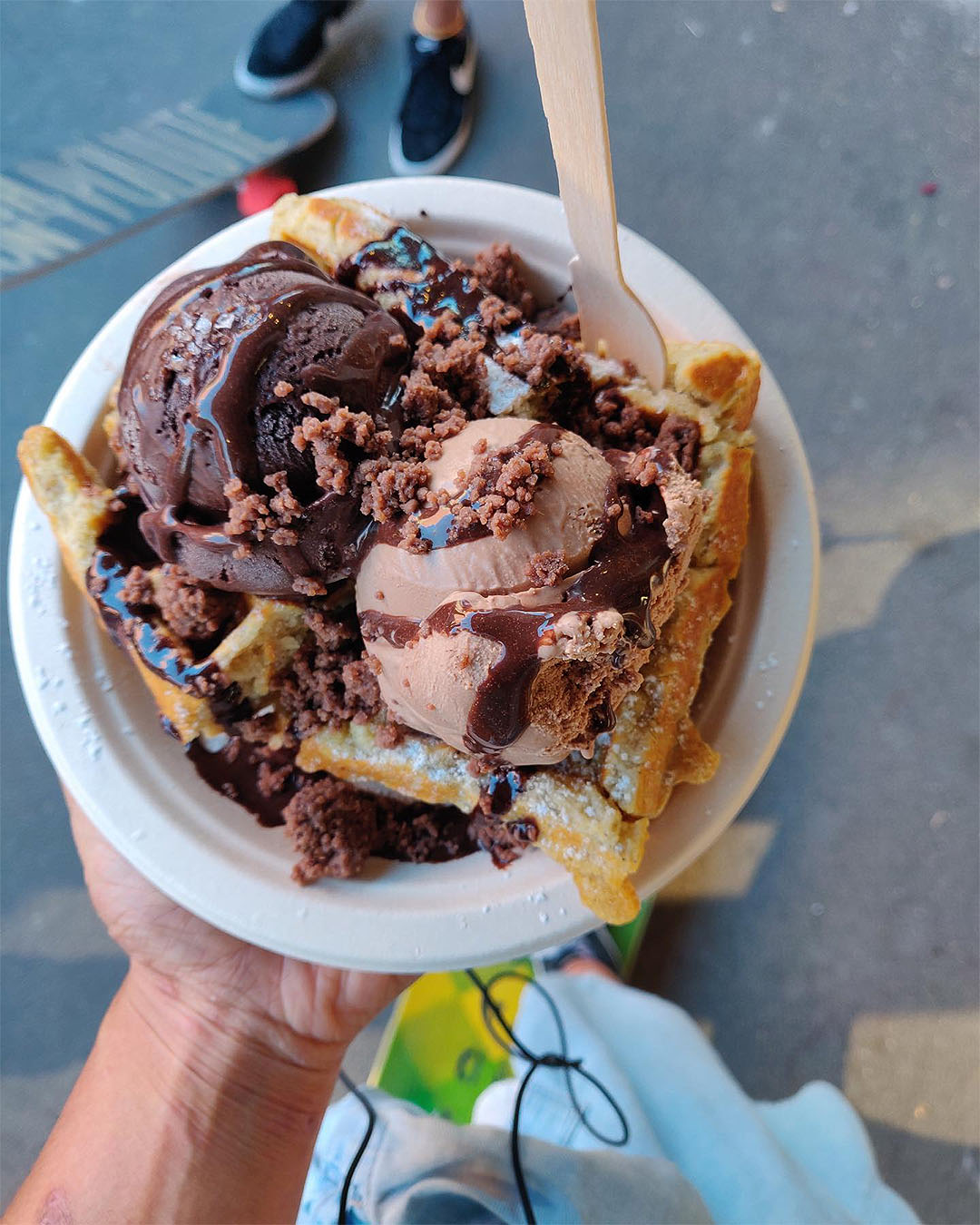 Heaping ice cream on delicious looking waffles at Utopia Ice in Christchurch.