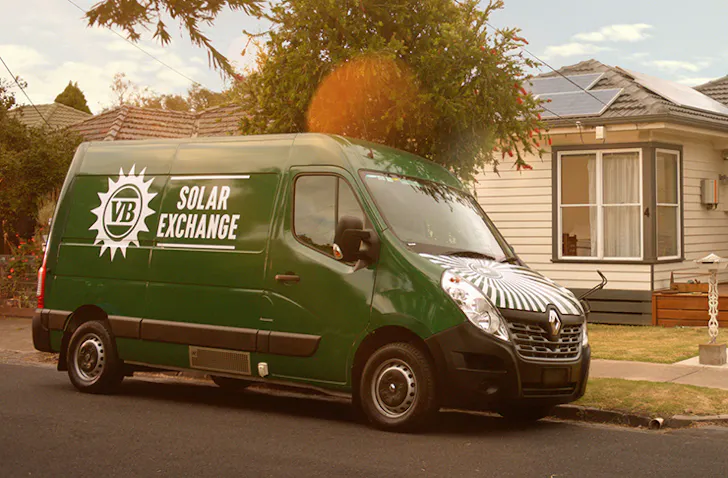 a green van with a sign that says 