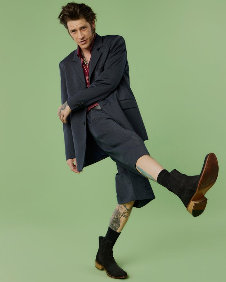 Vinnie Woolston wears archival Zambesi.