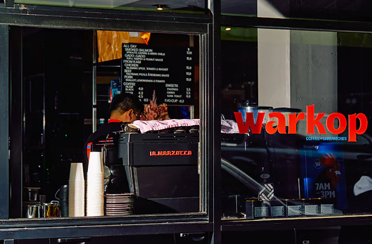 A coffee window with the logo 