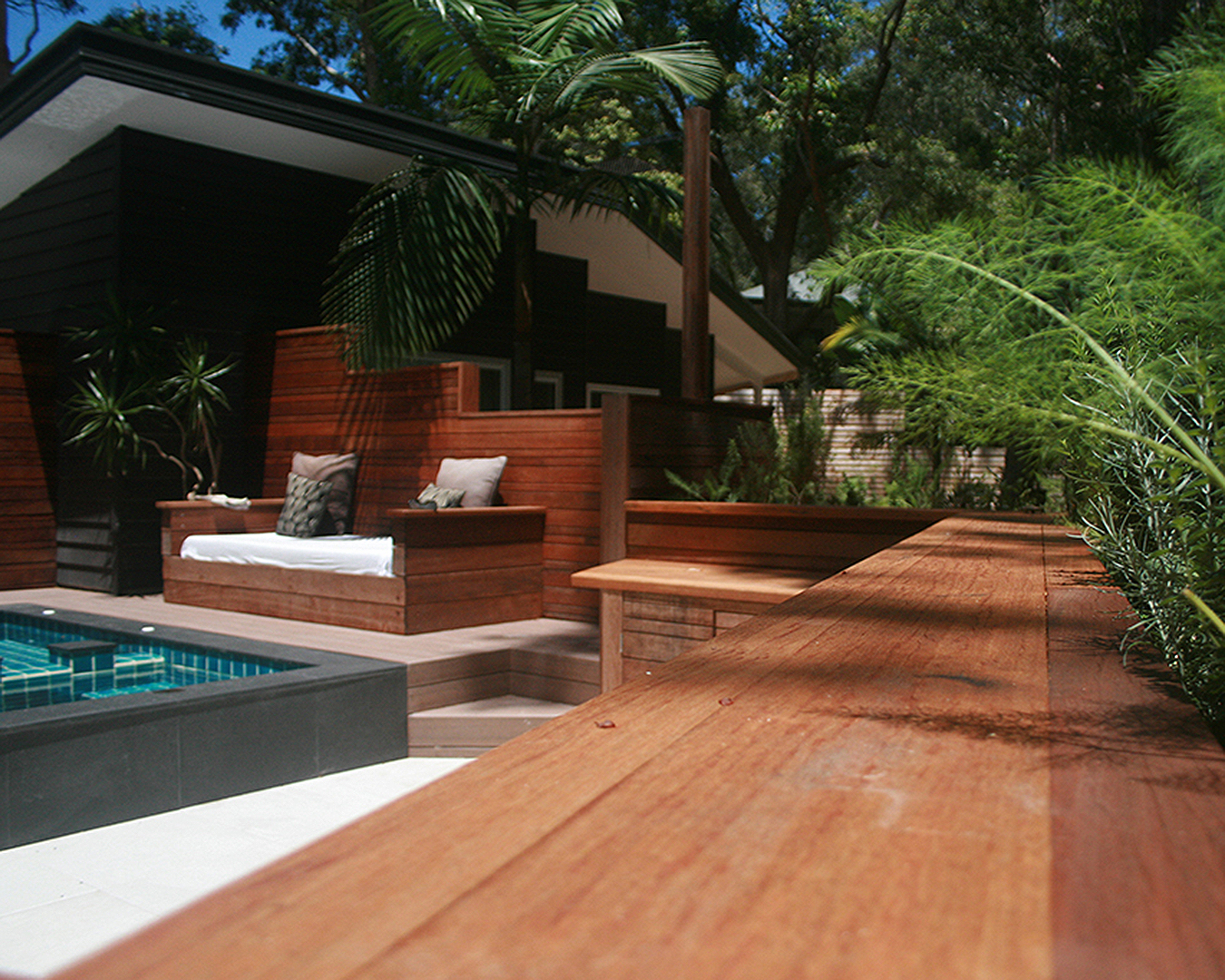 An awesome looking outdoor area looks out on to the pool.