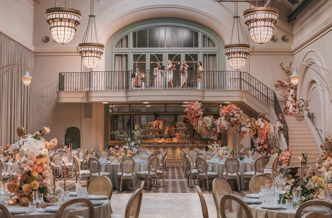A grand ballroom filled with flowers