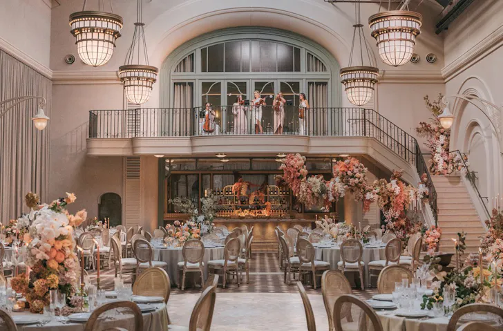 A grand ballroom filled with flowers