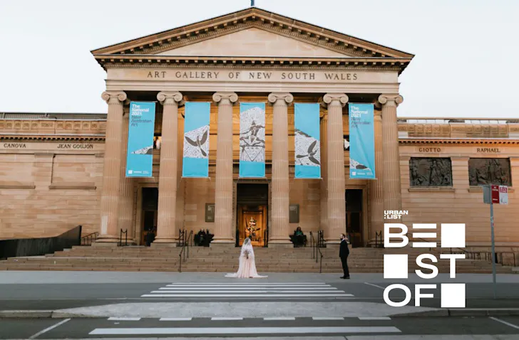 A bride and groom outside the Art Gallery of NSW, one of the best wedding venues in Sydney