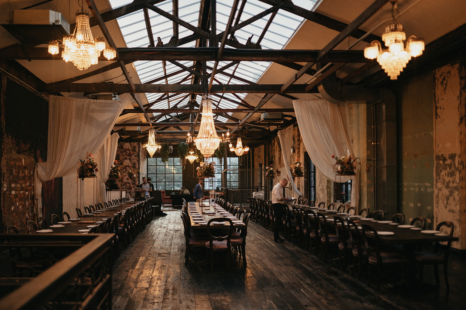 a heritage room filled with banquet tables at smoked garage, a brisbane wedding venue