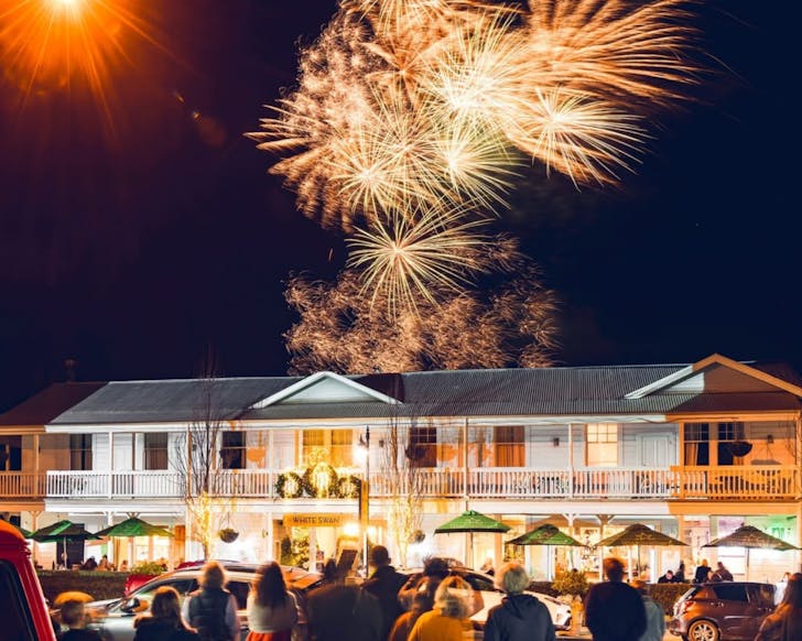Fireworks light up a street in Wellington
