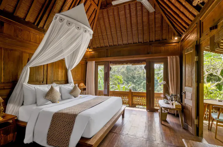 A luxurious jungle-style villa in Ubud, Bali, which is able to be booked as Airbnb Rooms. 