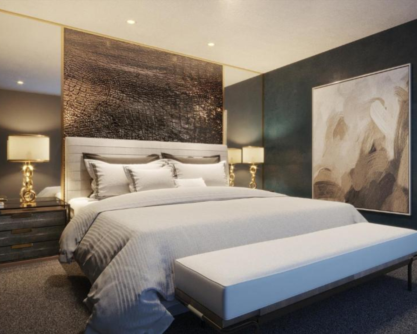 One of the apartments at Whitewood Suites shows off a huge bed, abstract wall art and luxurious gold-detaileddecor 