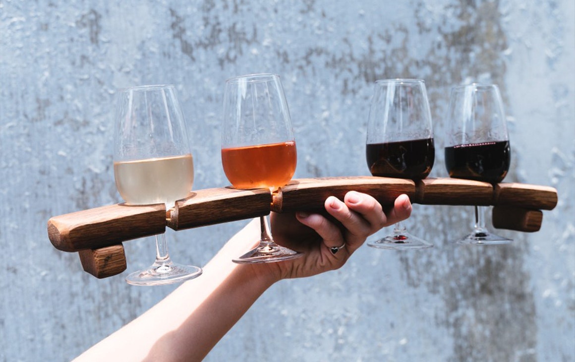 a tray of wine glasses