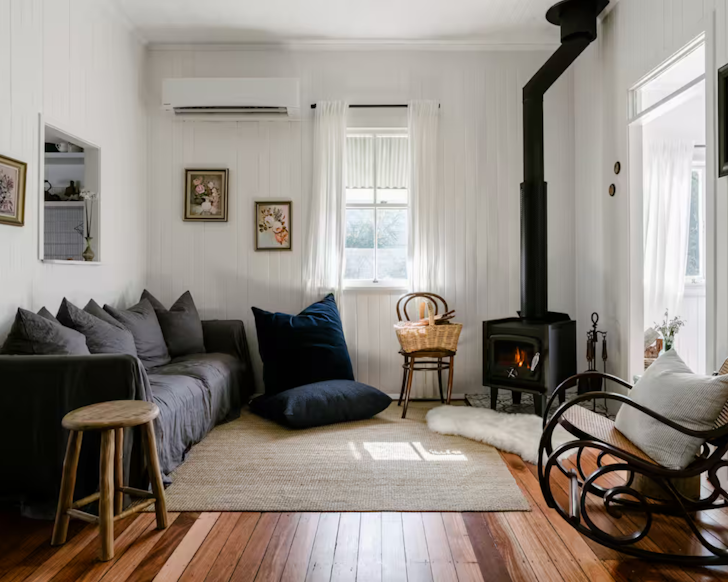 Cosy Gold Coast Airbnb cottage with warm lighting and vintage decor.