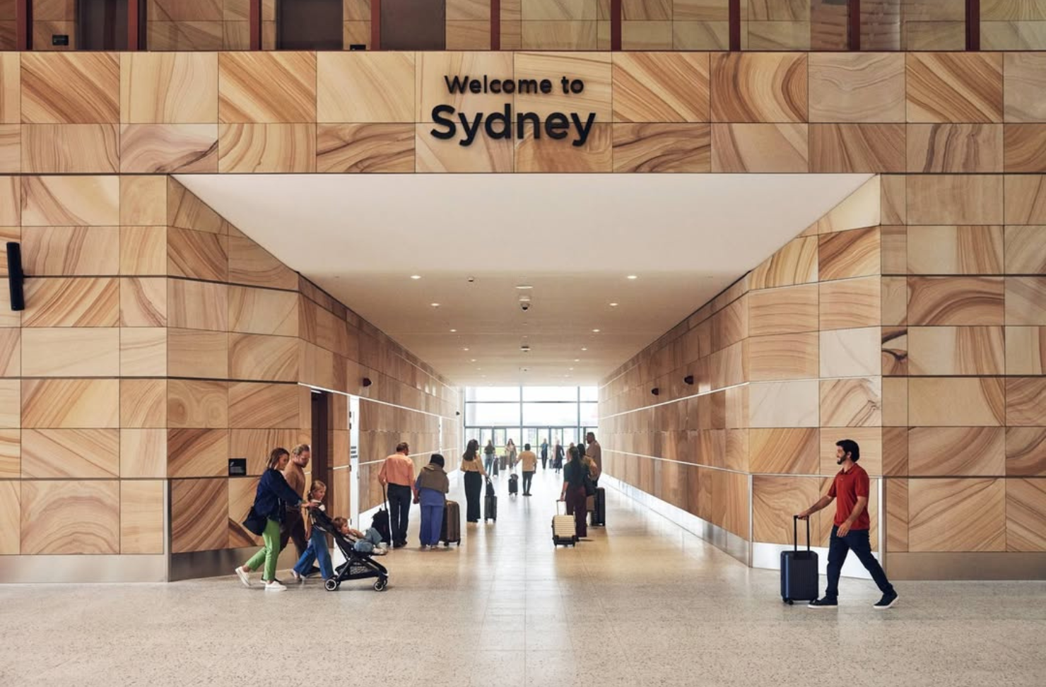 western sydney airport arrivals gate reads 'welcome to sydney'