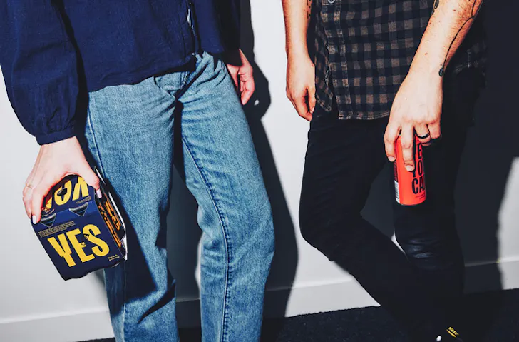 two people holding 