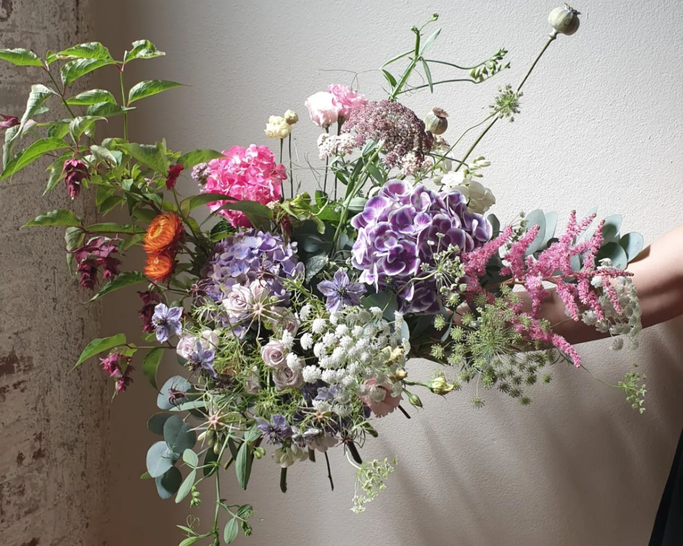 A bouquet of blooms from Yvette Edwards features delicate shapes and blush tones 