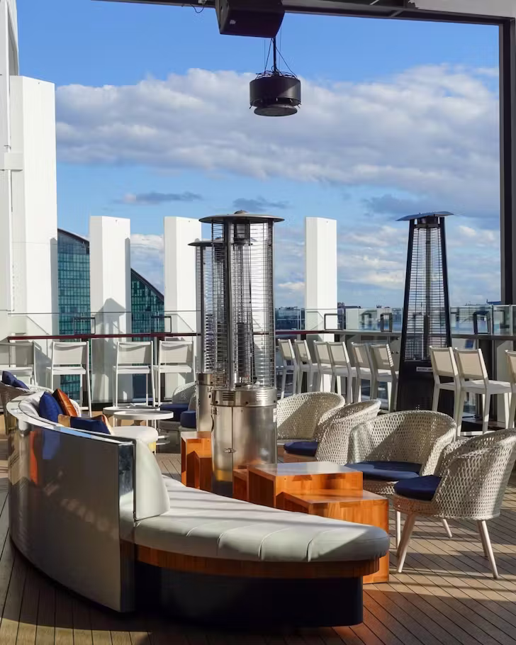 A brightly lit rooftop bar in Sydney's CBD