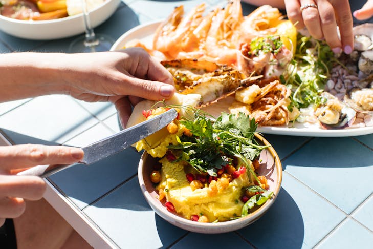 Plates of food available at Scarborough Beach Bar. 