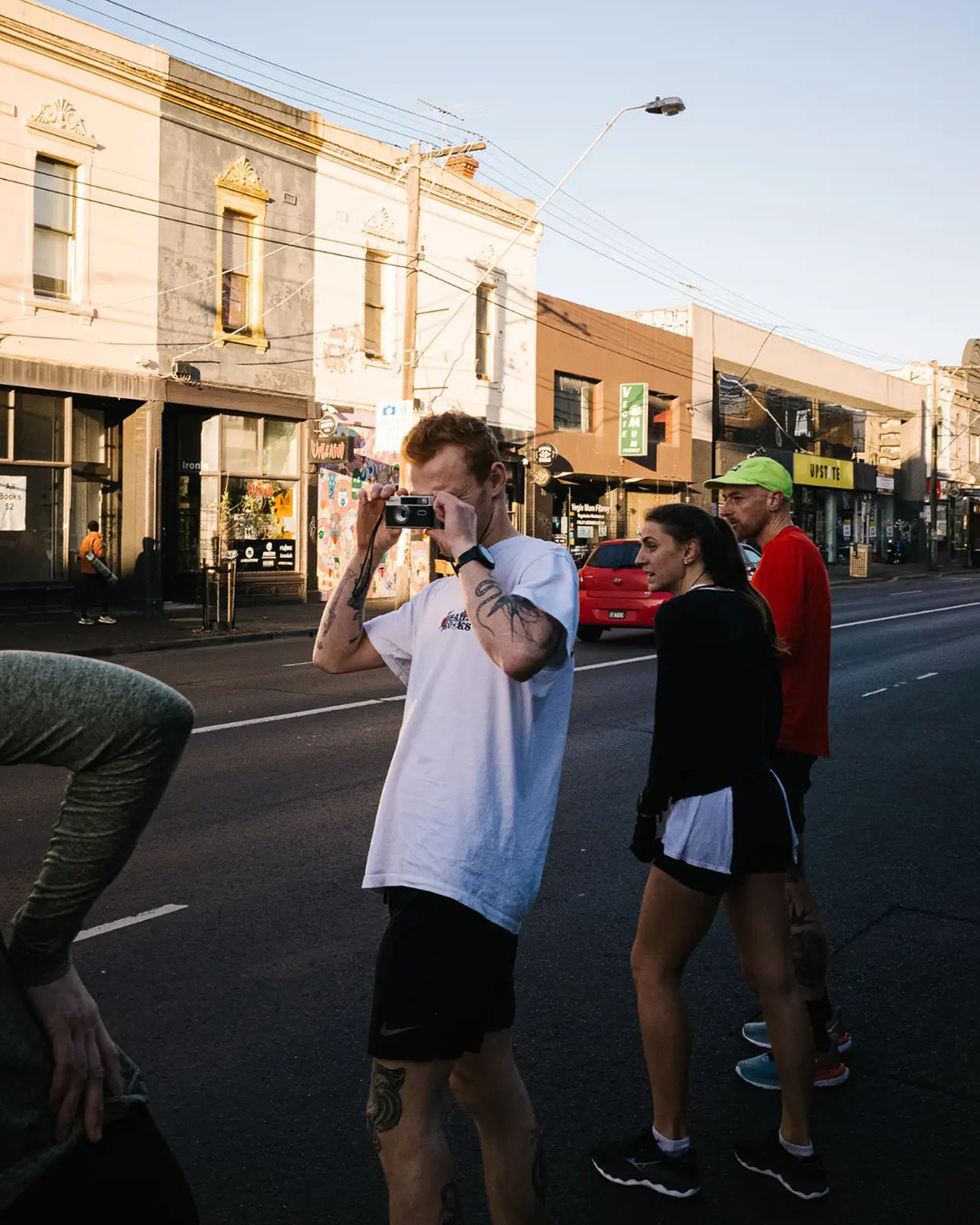 George Wintle at Ate Miles taking a photo with a disposable camera