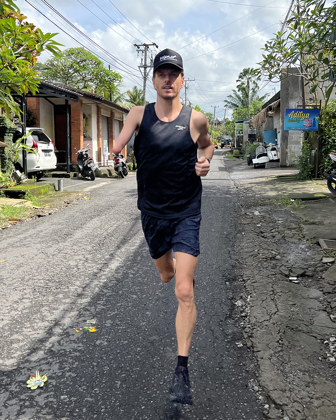 Michal Roeger running through the streets, abroad