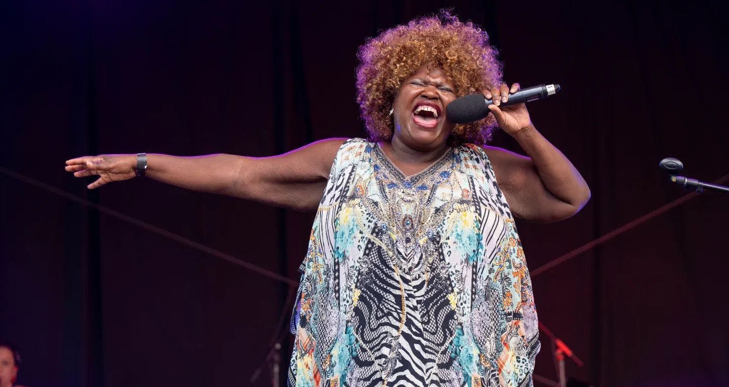 Lisa Hunt singing on stage