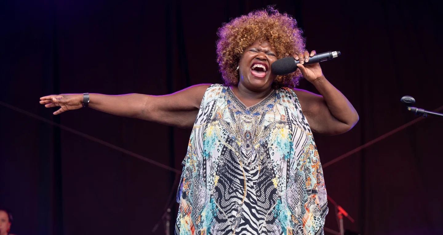 Lisa Hunt singing on stage