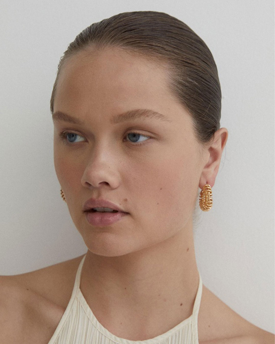 13 Gold Hoop Earrings To Polish Up Your Look