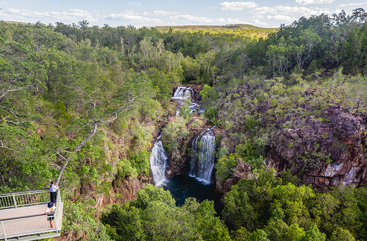 two people standing on viewing platform looking at florence falls