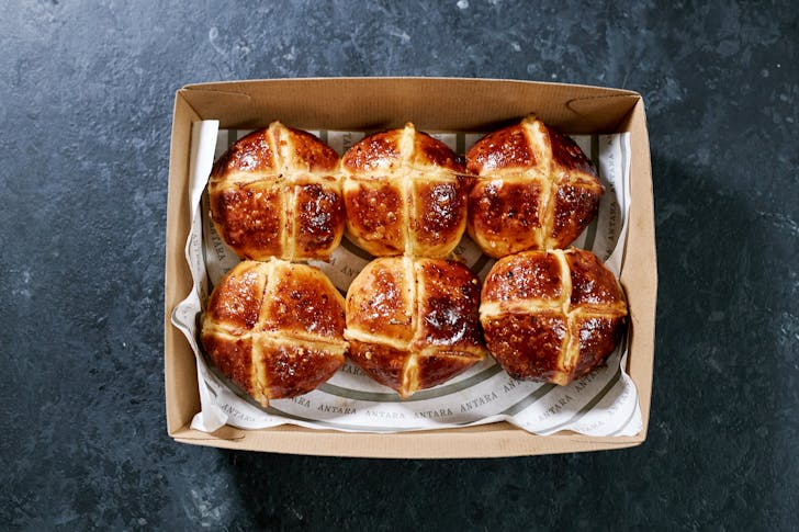 Antara's cheddar cheese, chilli, rosemary and hot honey hot cross buns.