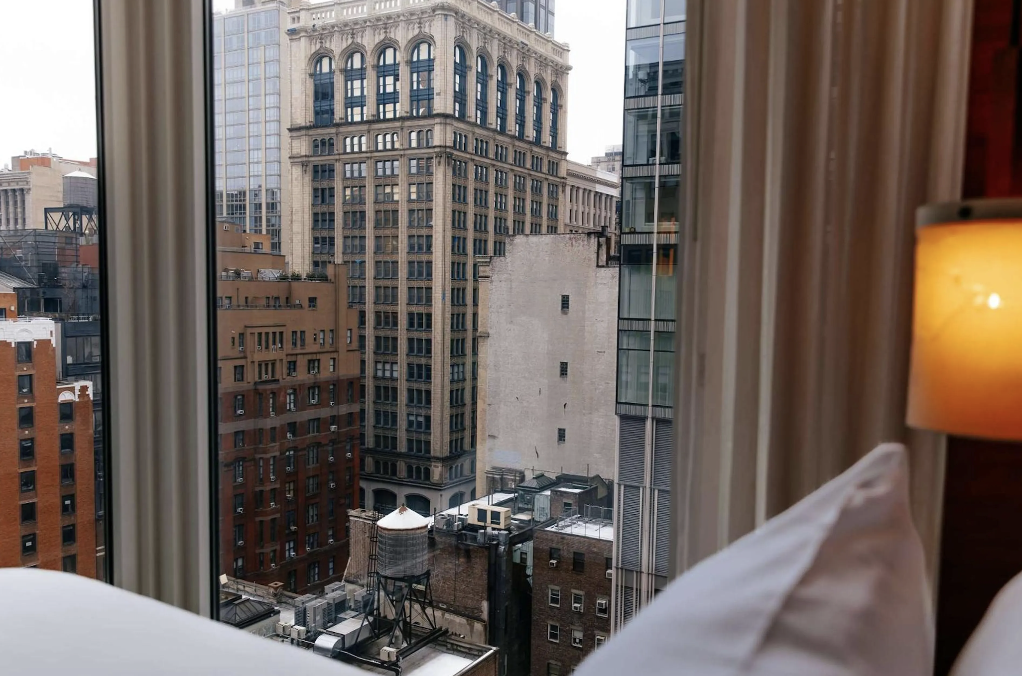 Arlo Nomad Hotel view of cityscape from bedroom