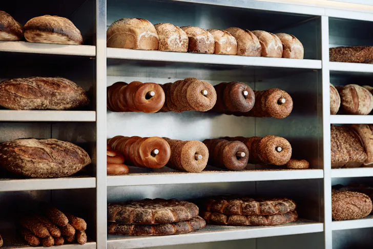 a wall of bread in a bakery