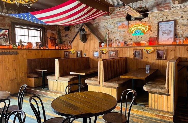 saloon style bar with bric a brac decorations