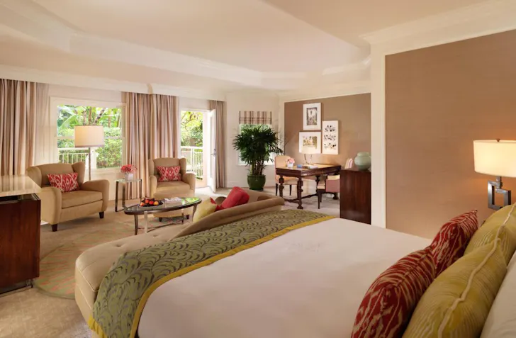 A bedroom at The Beverly Hills Hotel one of the best hotels for families Los Angeles