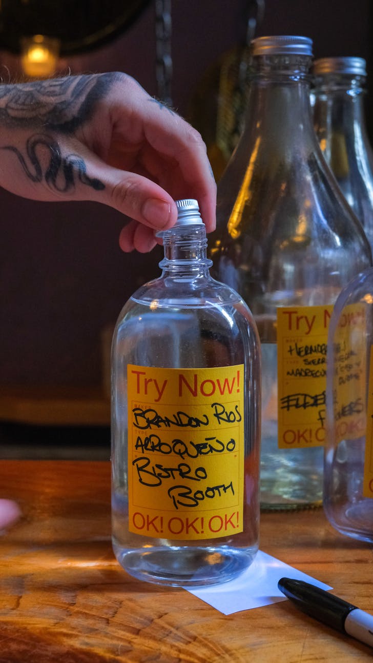 a clear glass with liquid in it